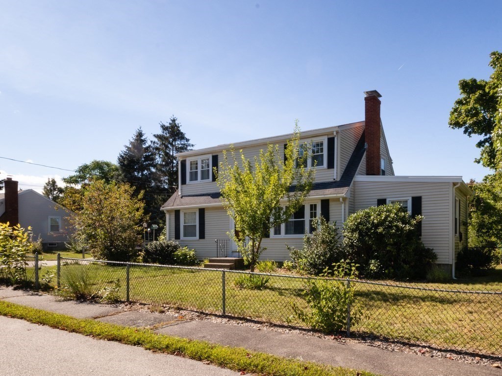 64 Judith Road Weymouth, MA 02191 - Photo 2 of 27 a front view of a house with a yard