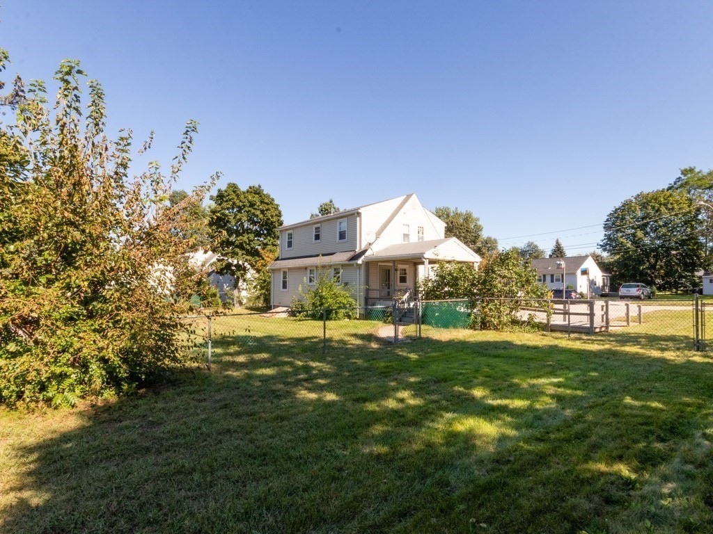 64 Judith Road Weymouth, MA 02191 - Photo 25 of 27 a front view of a house with a yard