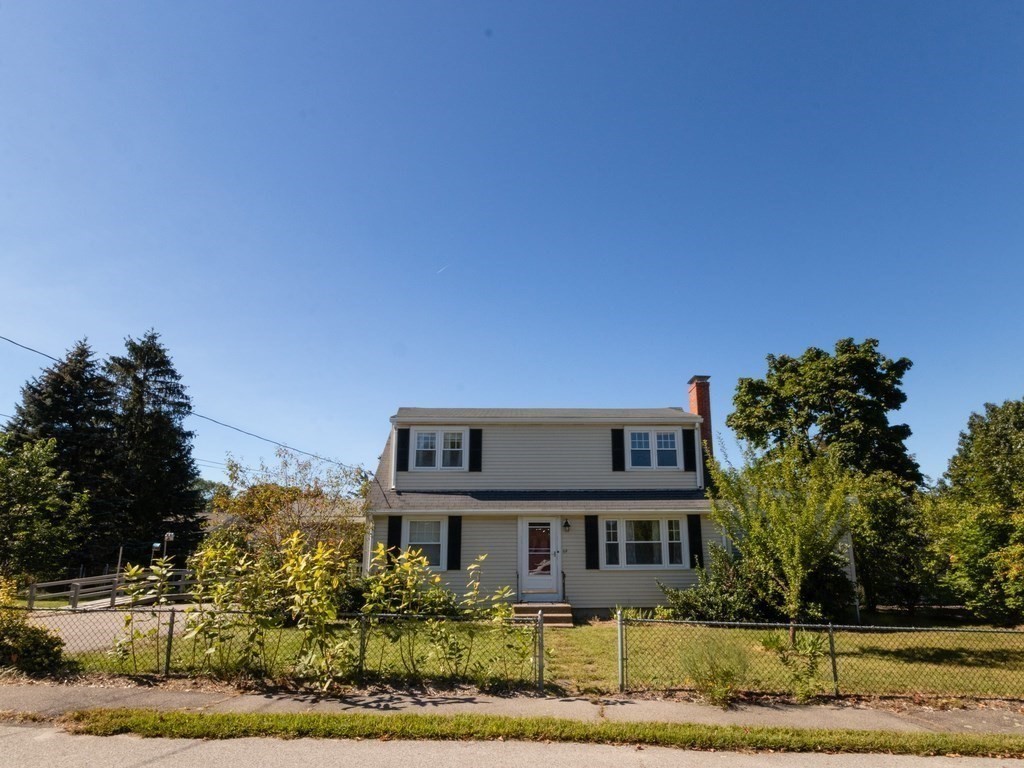 64 Judith Road Weymouth, MA 02191 - Photo 3 of 27 a front view of a house with a yard