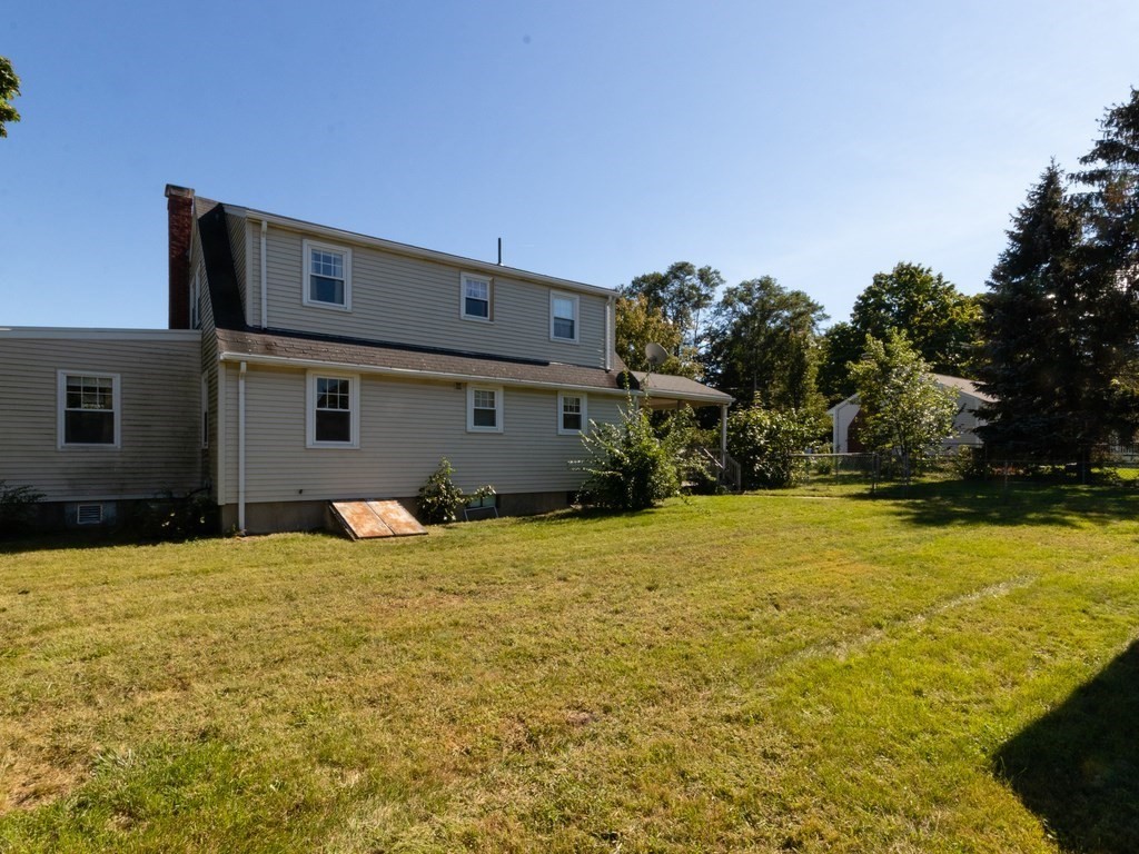 64 Judith Road Weymouth, MA 02191 - Photo 5 of 27 a view of a house with a yard