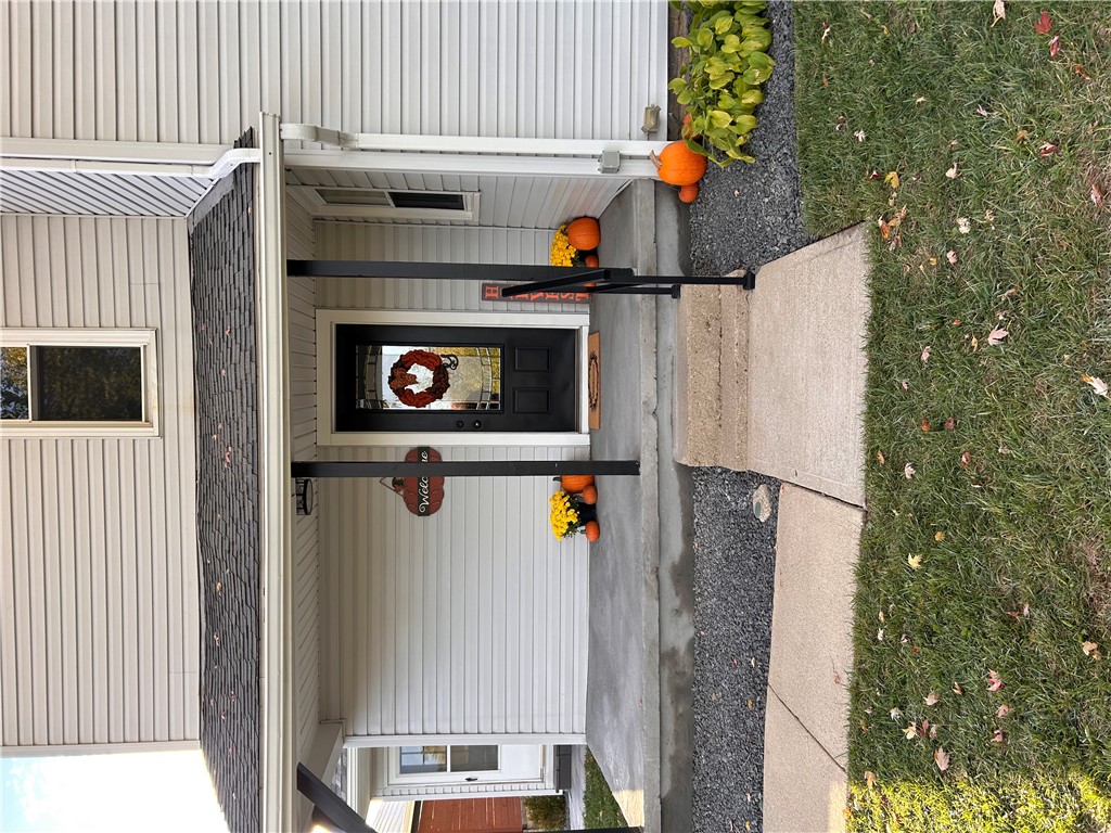 2086 Scheyhing Road Lewisburg, OH 45338 - Photo 2 of 29 A welcoming facade with a covered porch beckons guests inside this charming residence.
