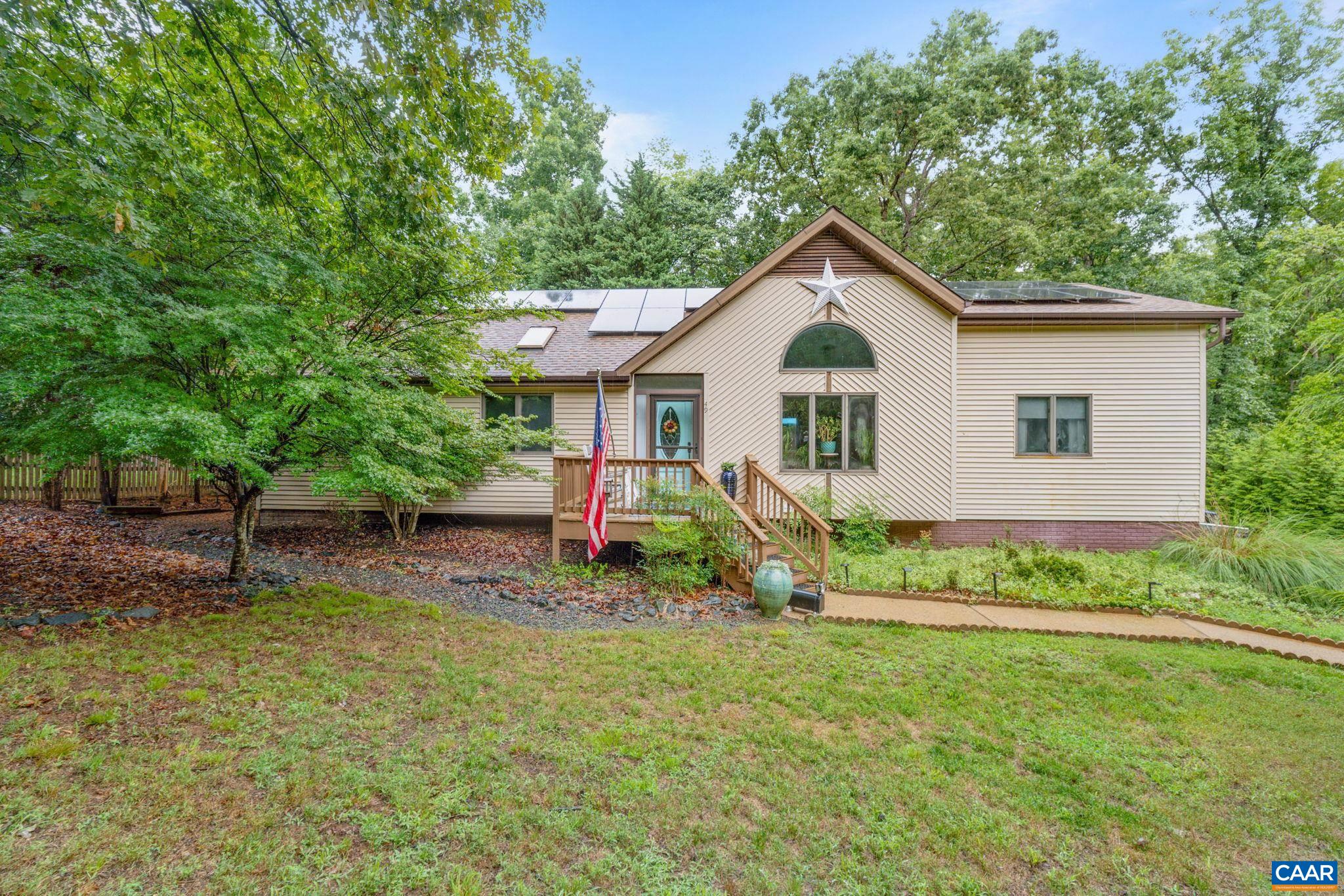 49 Amethyst Road Palmyra, VA 22963 - Photo 4 of 55 a view of a house with a yard and plants