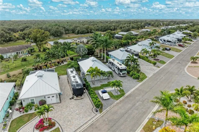 an aerial view of a house with a garden and outdoor space