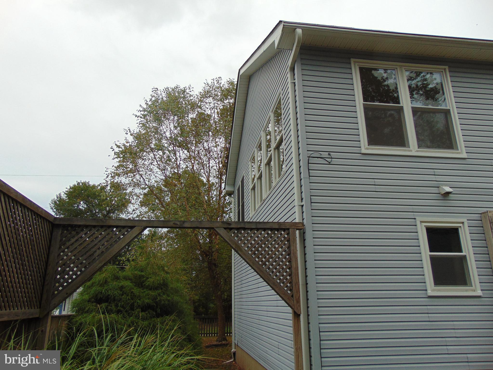 1710 Bayview Road Shady Side, MD 20764 - Photo 29 of 104 Side view of home facing the bay.
