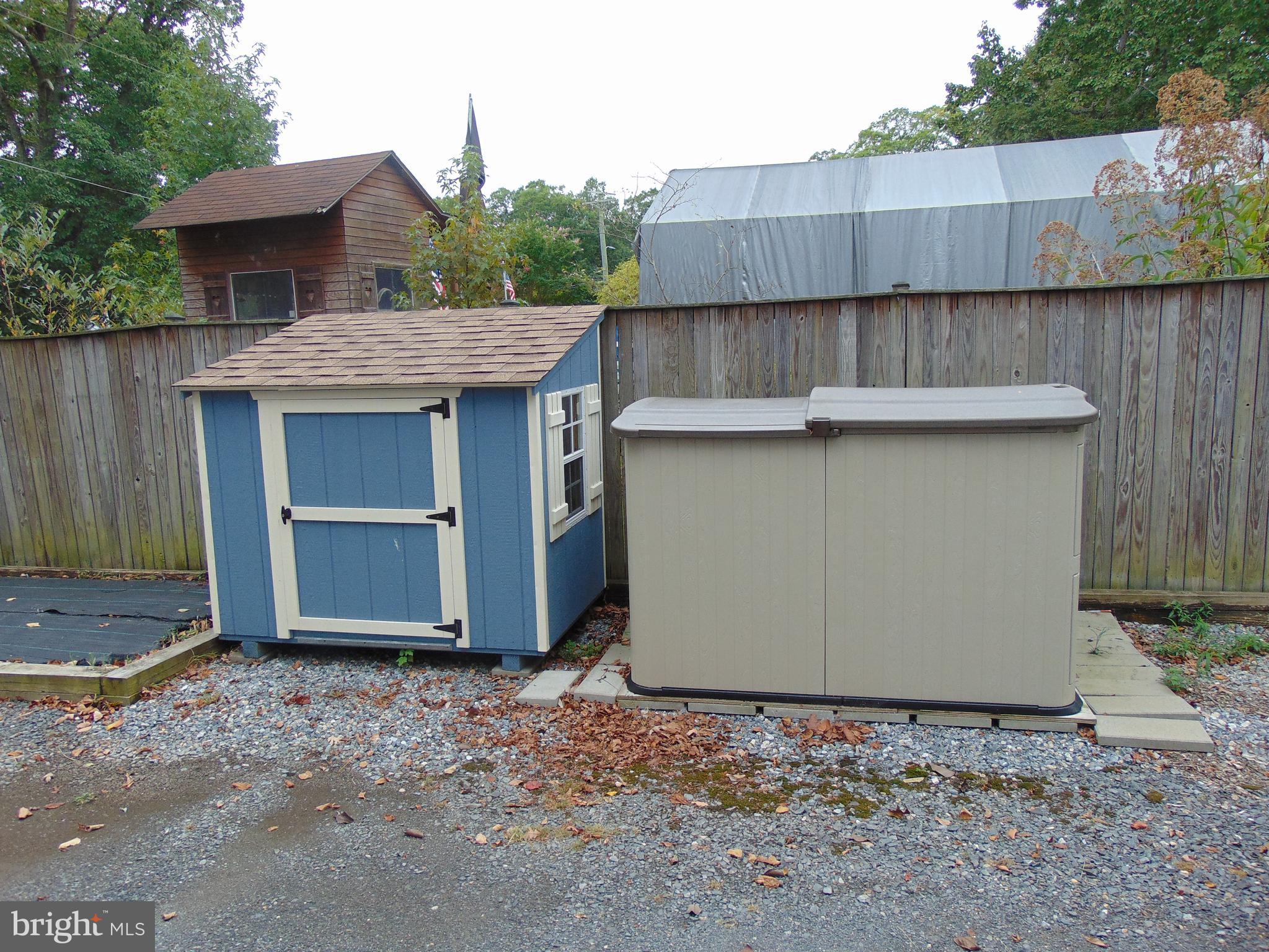 1710 Bayview Road Shady Side, MD 20764 - Photo 7 of 104 Two extra storage sheds in driveway.