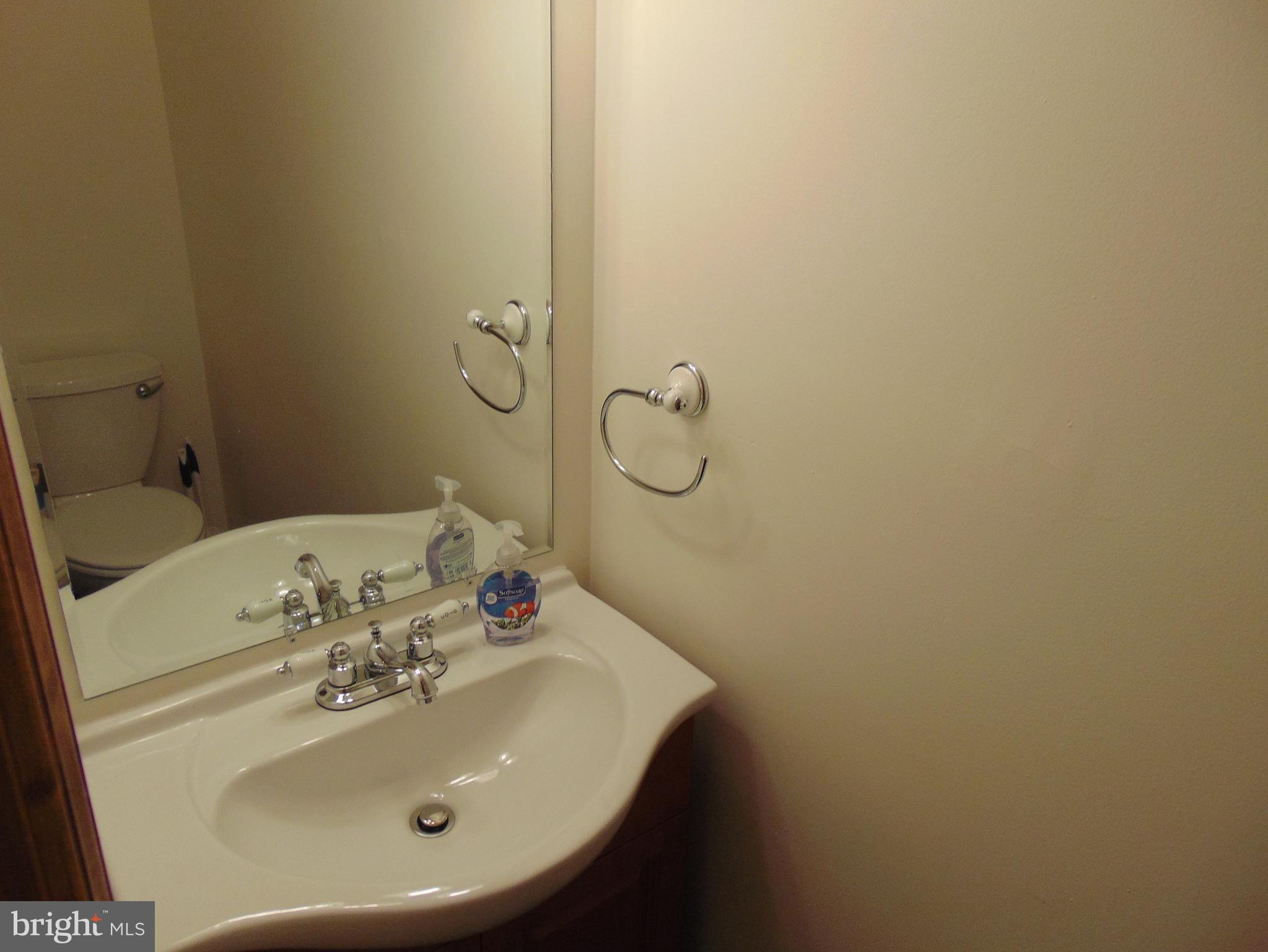 1710 Bayview Road Shady Side, MD 20764 - Photo 62 of 104 1/2 bath in downstairs hallway.