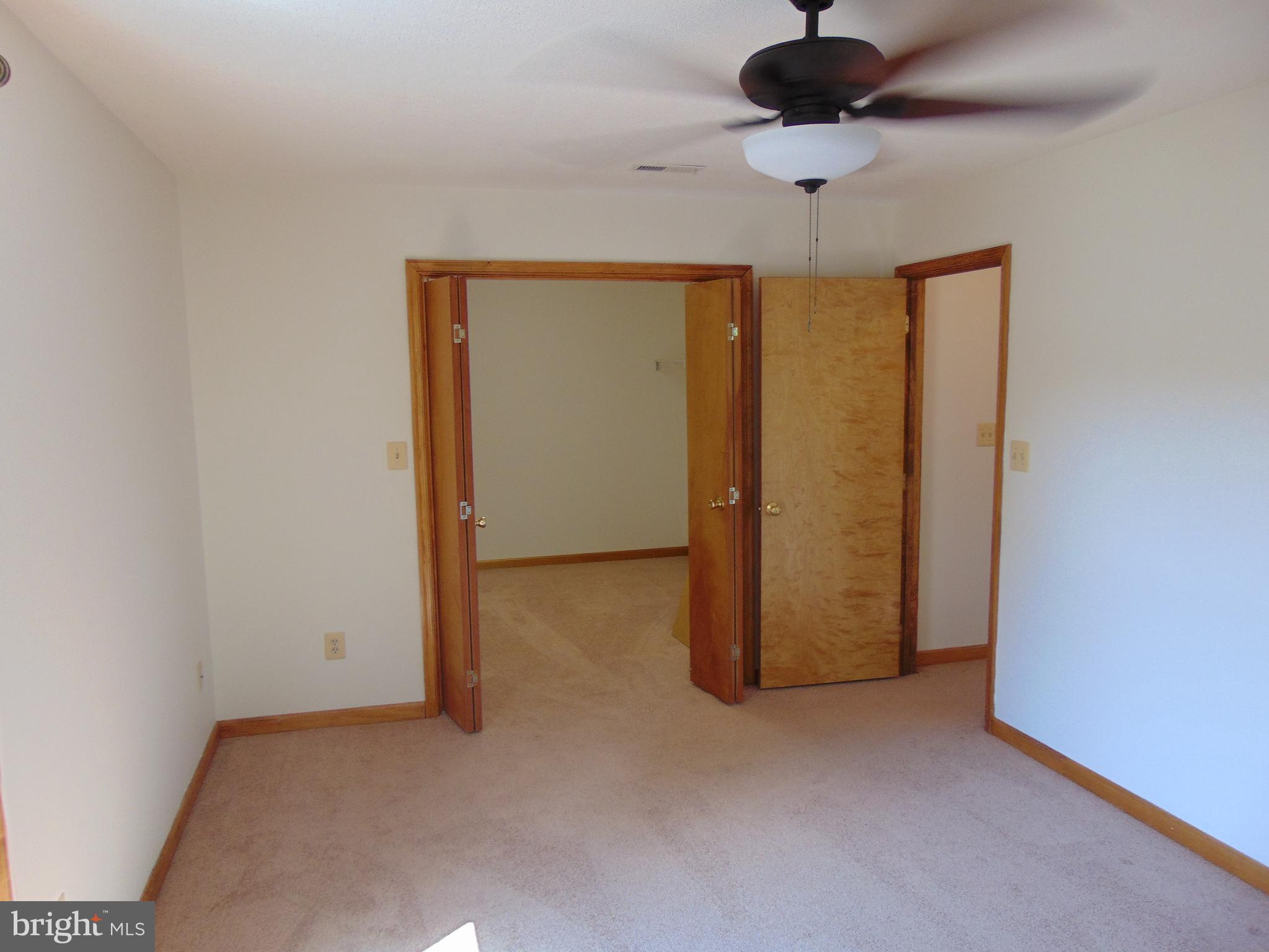 1710 Bayview Road Shady Side, MD 20764 - Photo 67 of 104 Large upstairs bedroom looking into huge walk in.