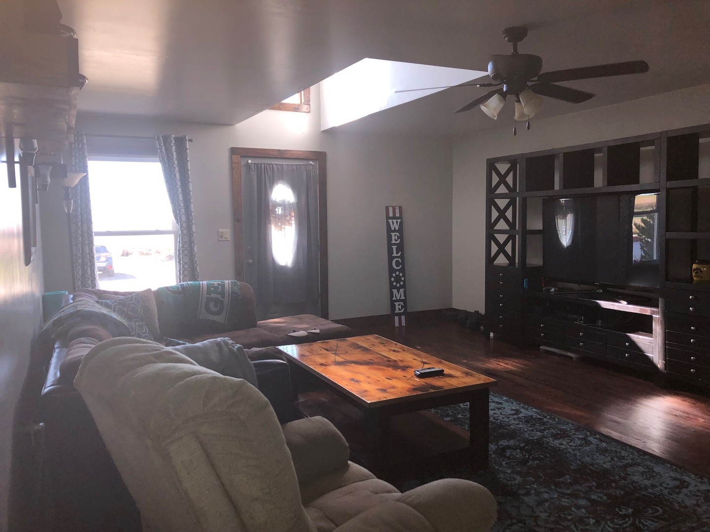 791 North 36th Road Utica, IL 61373 - Photo 5 of 24 a bed room with a bed and a chandelier