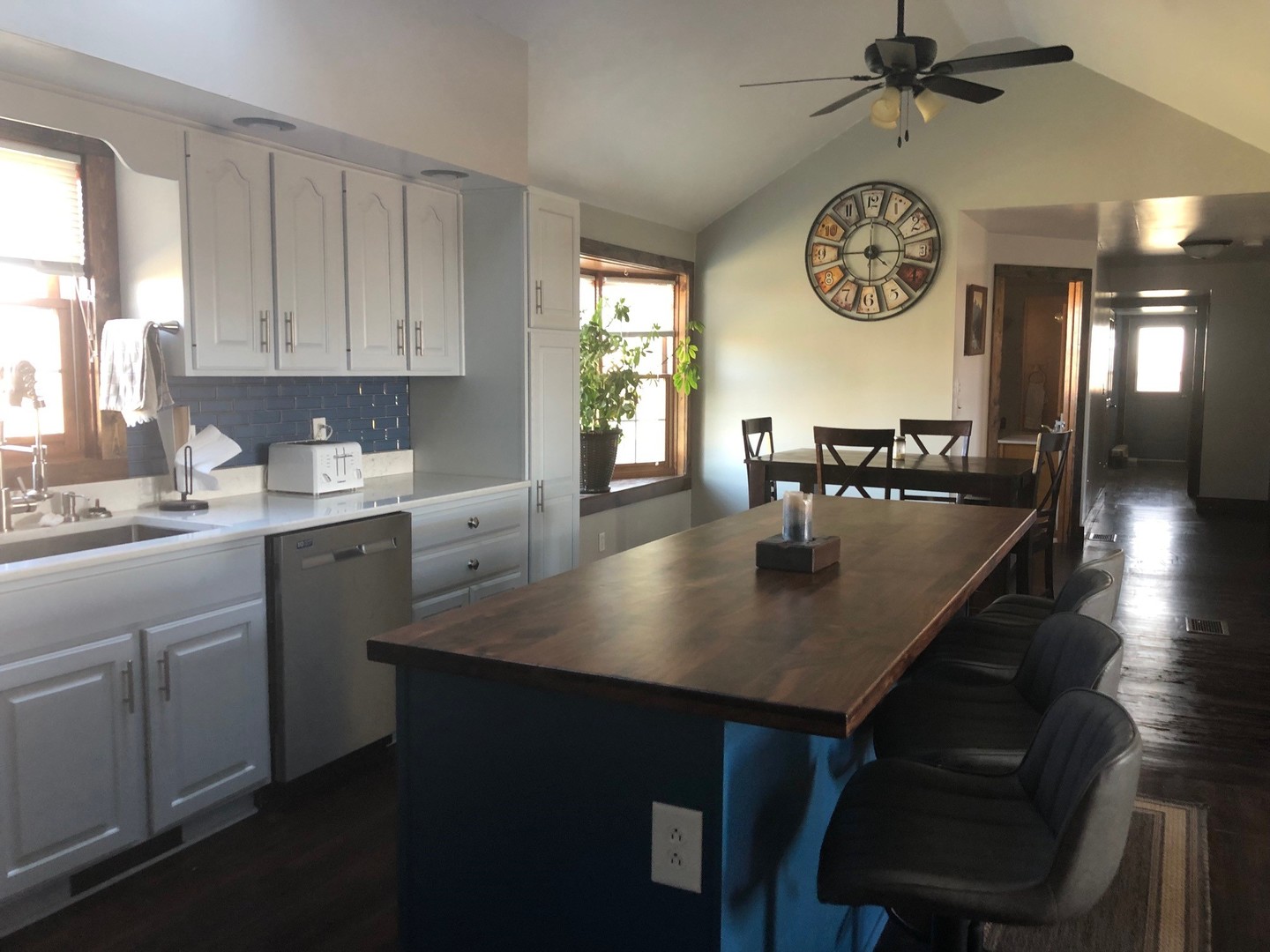 791 North 36th Road Utica, IL 61373 - Photo 6 of 24 a kitchen with a table chairs and a stove in it
