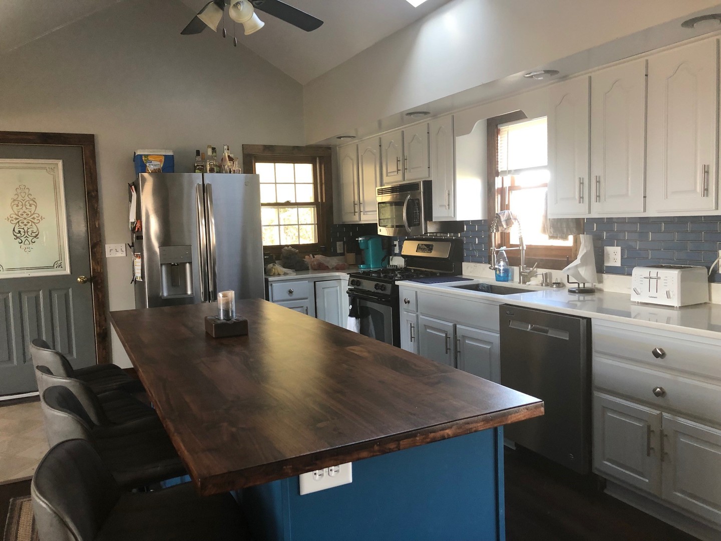 791 North 36th Road Utica, IL 61373 - Photo 8 of 24 a kitchen with a table chairs refrigerator and cabinets