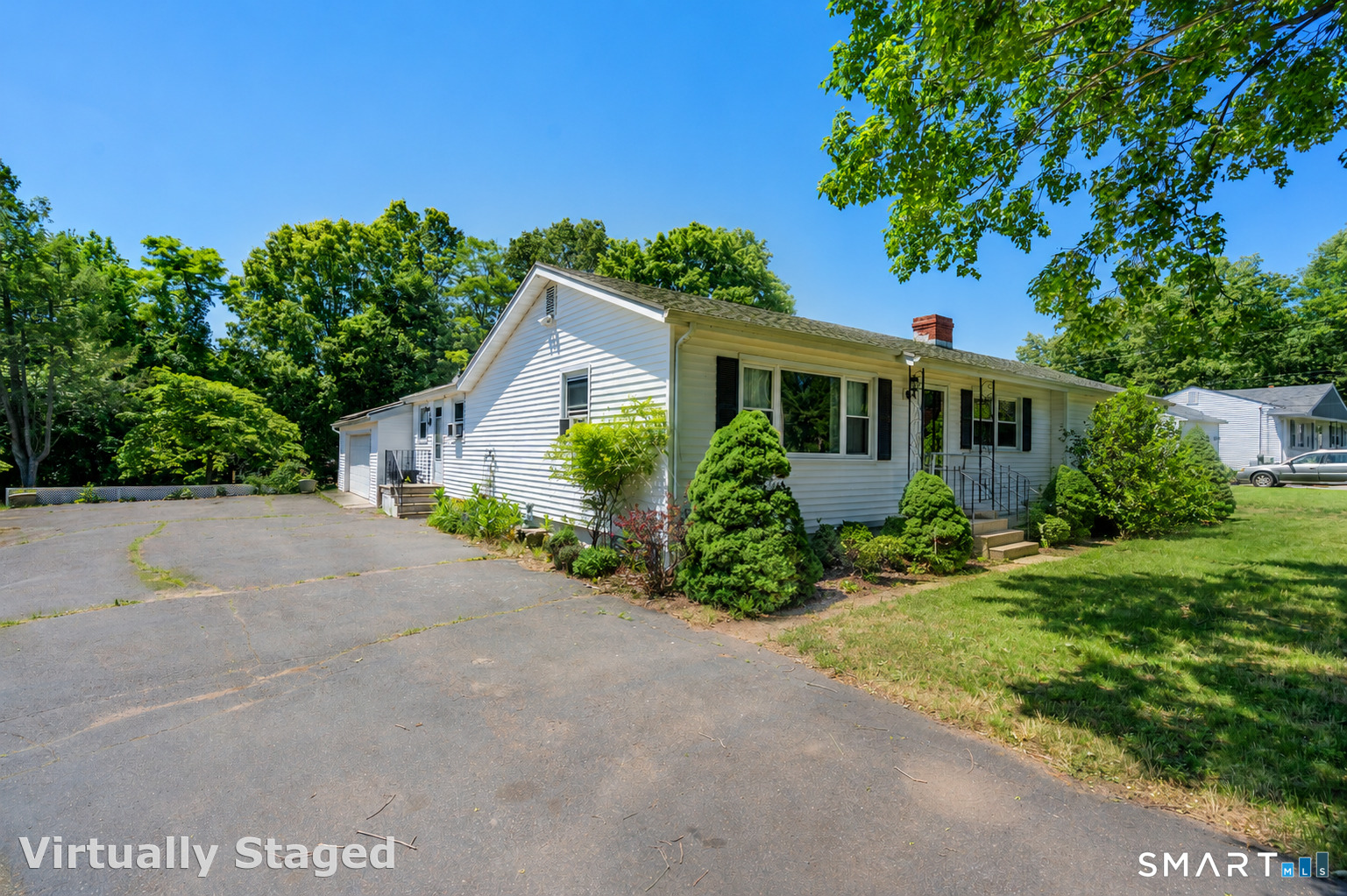 9 Stanton Road North Haven, CT 06473 - Photo 2 of 35 a front view of a house with a yard