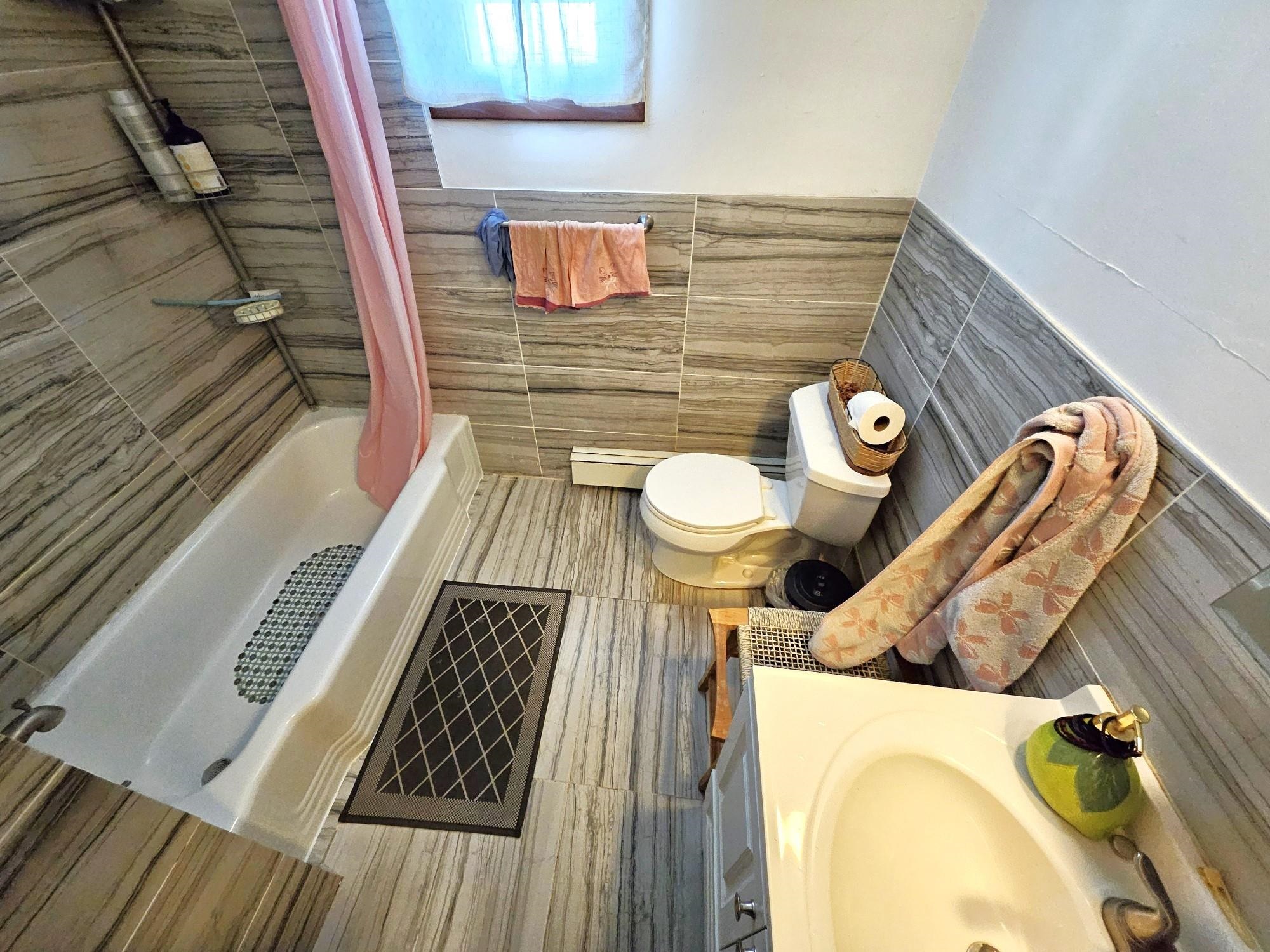 775 3rd Street, Unit 2 Secaucus, NJ 07094 - Photo 6 of 23 a bathroom with a toilet and a sink