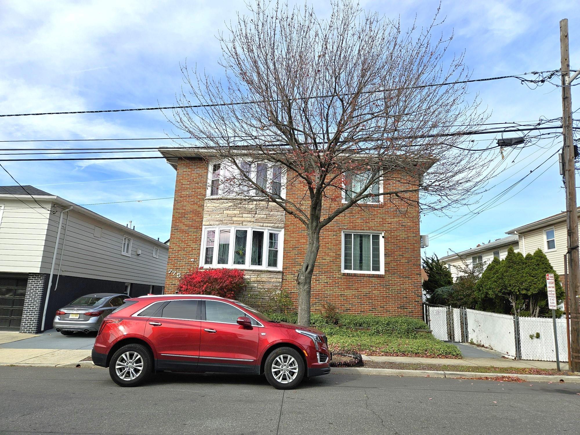 775 3rd Street, Unit 2 Secaucus, NJ 07094 - Photo 9 of 23 a car parked in front of a house