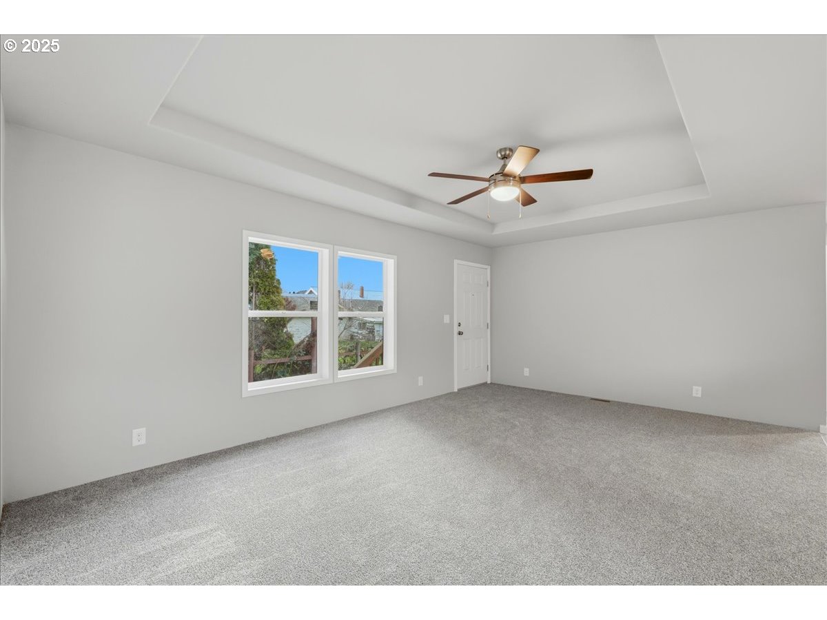 20815 Walnut Street Northeast Aurora, OR 97002 - Photo 13 of 32 a view of an empty room with a window