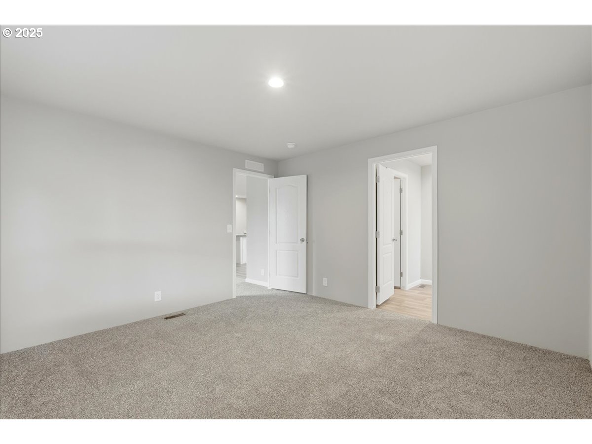 20815 Walnut Street Northeast Aurora, OR 97002 - Photo 15 of 32 a view of an empty room