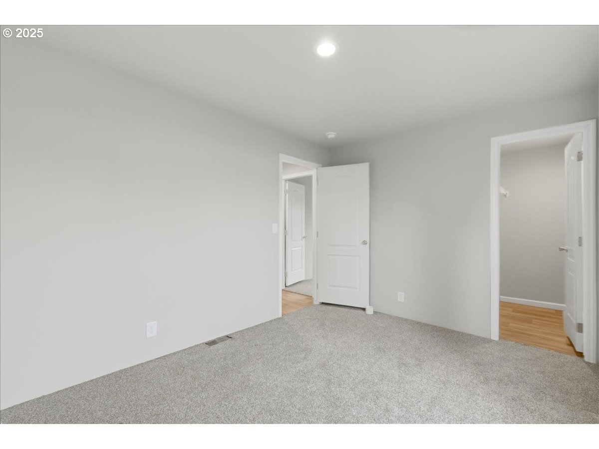 20815 Walnut Street Northeast Aurora, OR 97002 - Photo 18 of 32 a view of an empty room