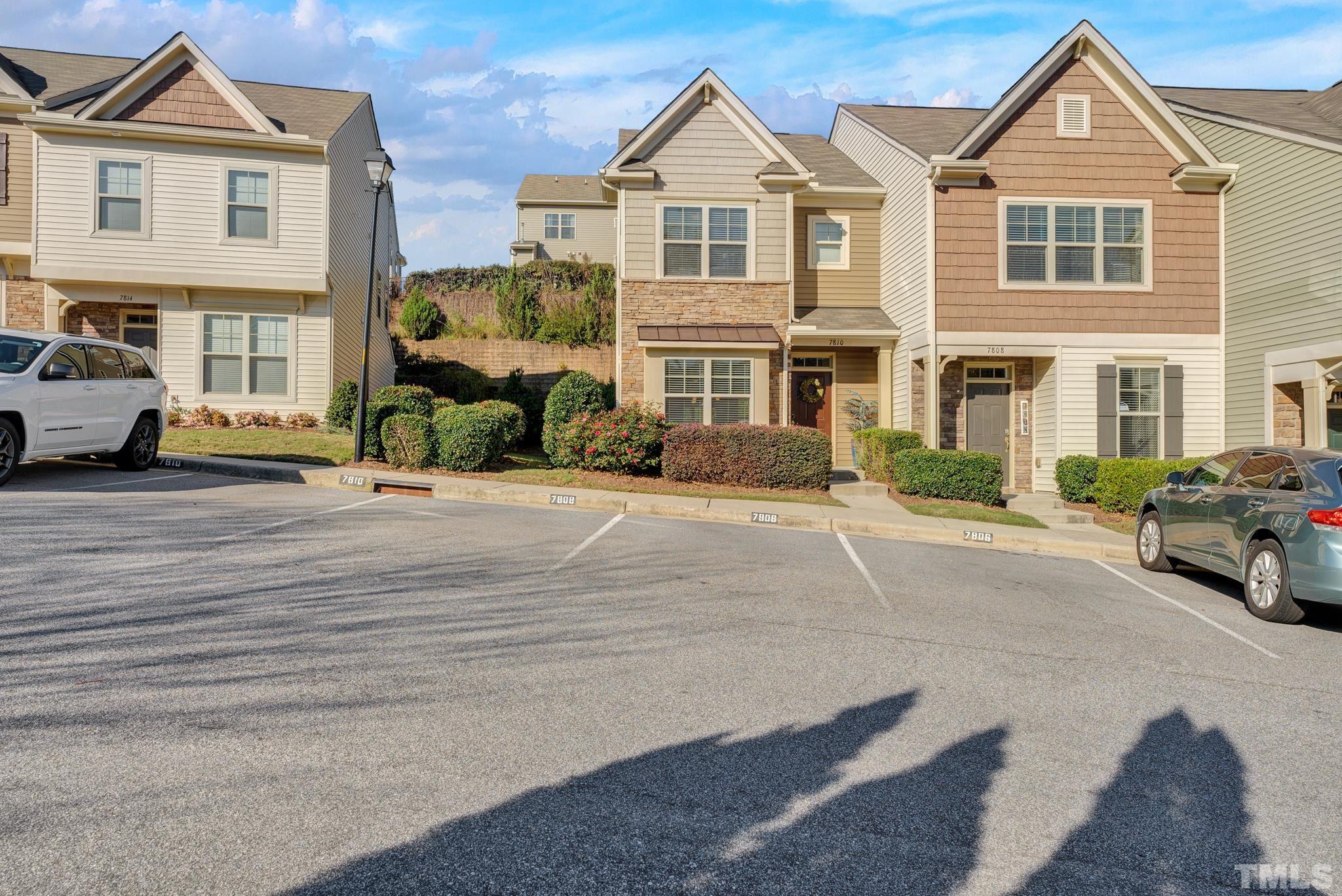 7810 Allscott Way Raleigh, NC 27612 - Photo 3 of 29 a front view of a house with a yard