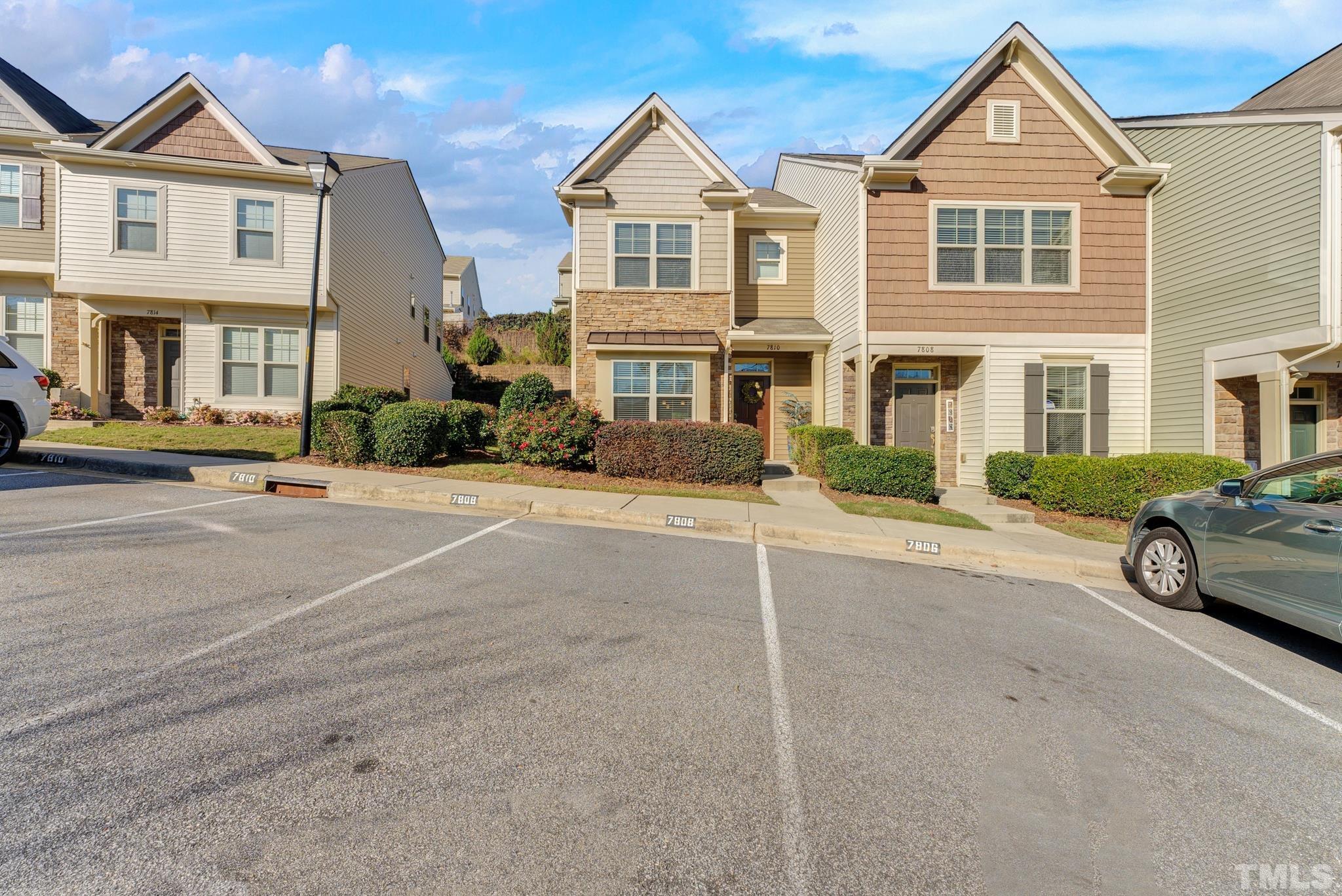 7810 Allscott Way Raleigh, NC 27612 - Photo 5 of 29 a view of multiple houses with a street