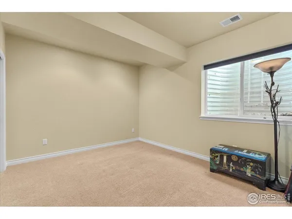 a view of a livingroom with kitchen