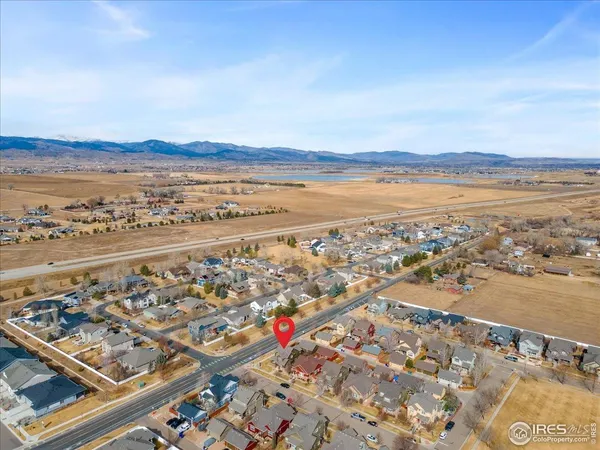 an aerial view of residential building and ocean view
