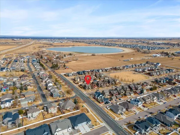 an aerial view of residential building and ocean view