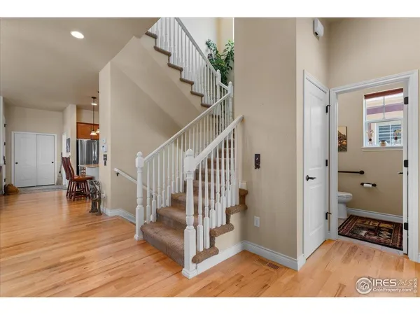 a view of a living room and dining room