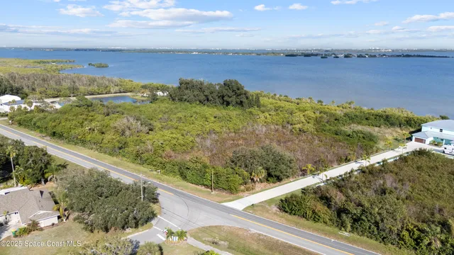 a view of a lake from a balcony