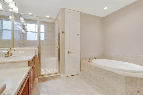 $995,000 | 517 Avellino Isles Circle, Unit 101, Naples, FL 34119