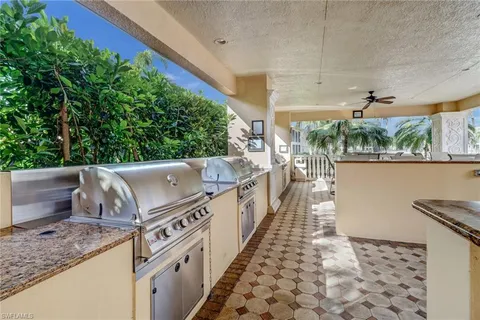$995,000 | 517 Avellino Isles Circle, Unit 101, Naples, FL 34119