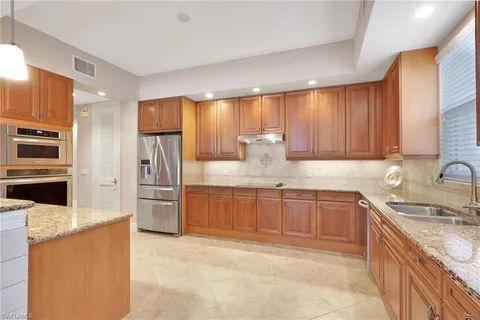 $995,000 | 517 Avellino Isles Circle, Unit 101, Naples, FL 34119