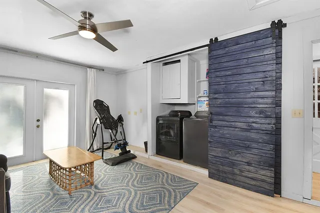 a view of a room with gym equipment