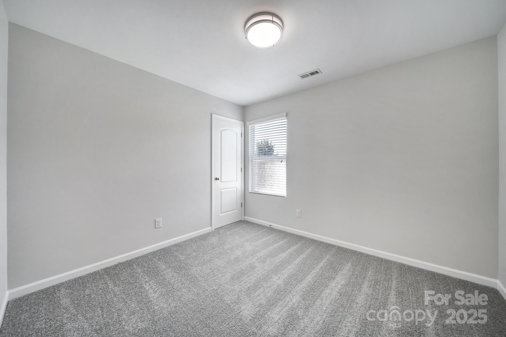 1541 Spring Blossom Trail Fort Mill, SC 29708 - Photo 30 of 43 wooden floor in an empty room