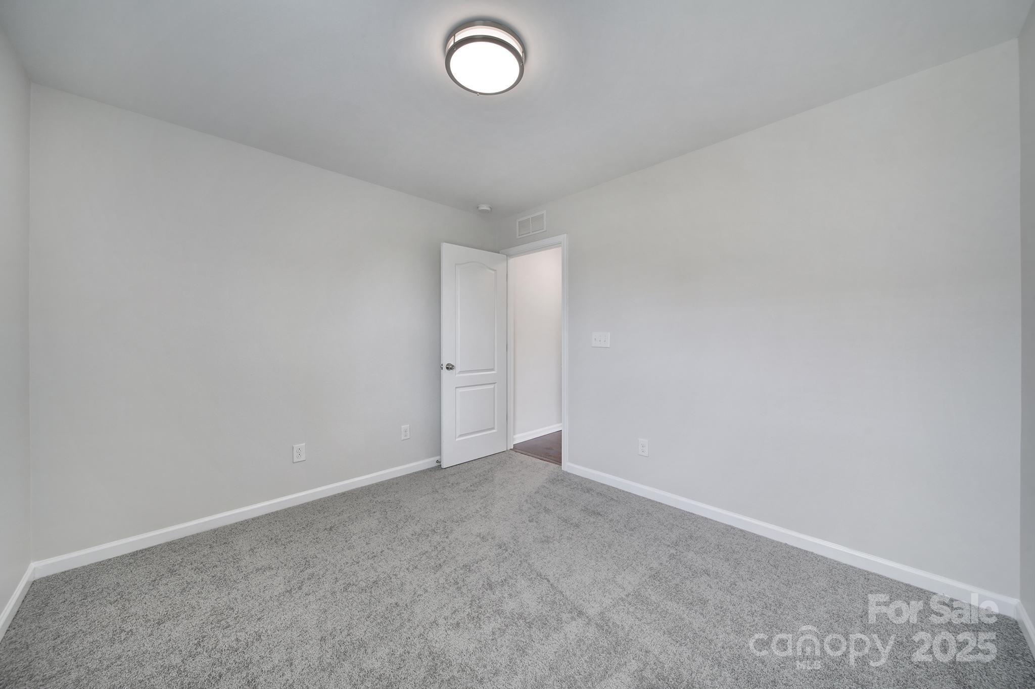 1541 Spring Blossom Trail Fort Mill, SC 29708 - Photo 31 of 43 a view of an empty room
