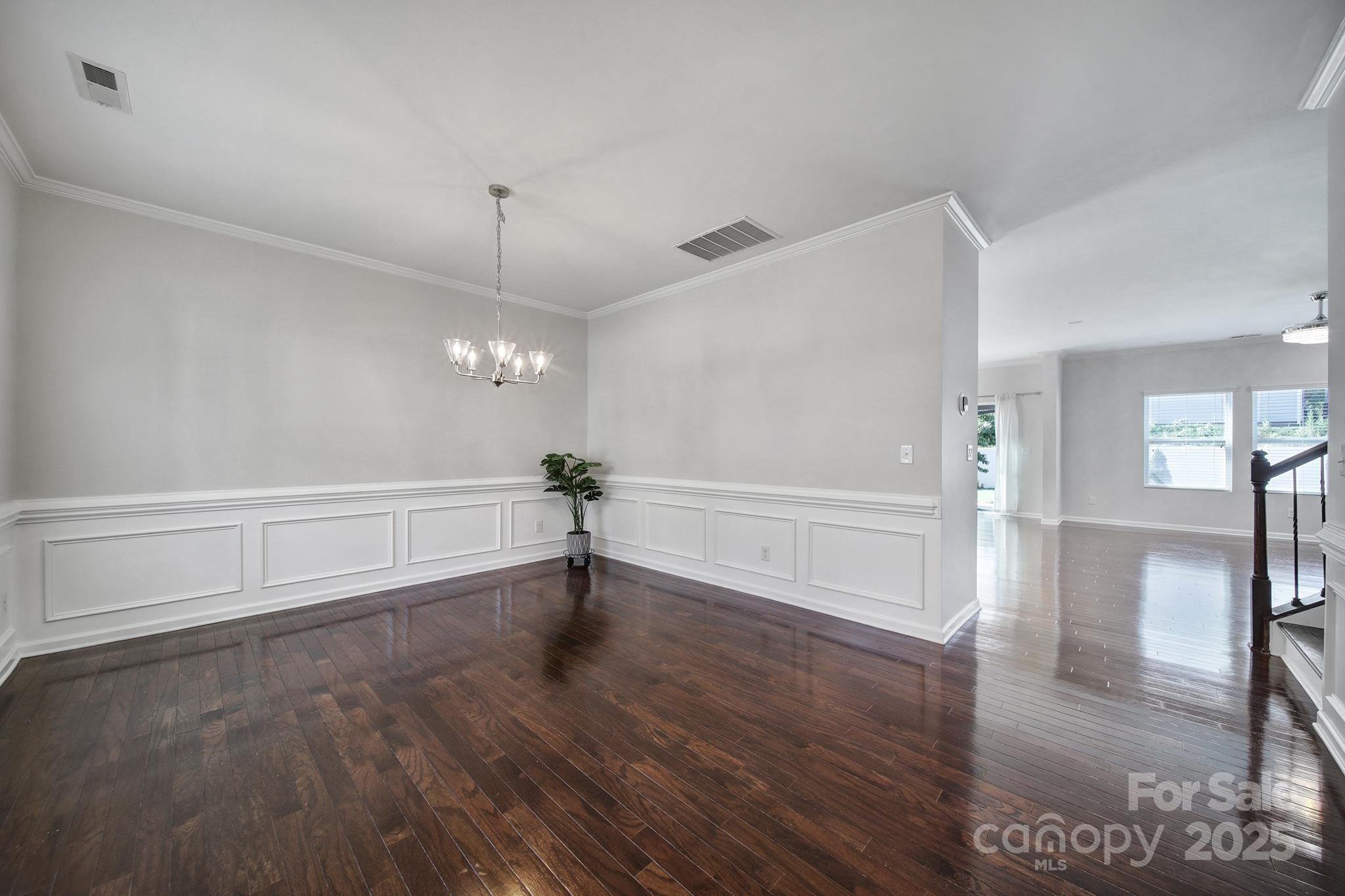 1541 Spring Blossom Trail Fort Mill, SC 29708 - Photo 7 of 43 a view of an empty room and wooden floor