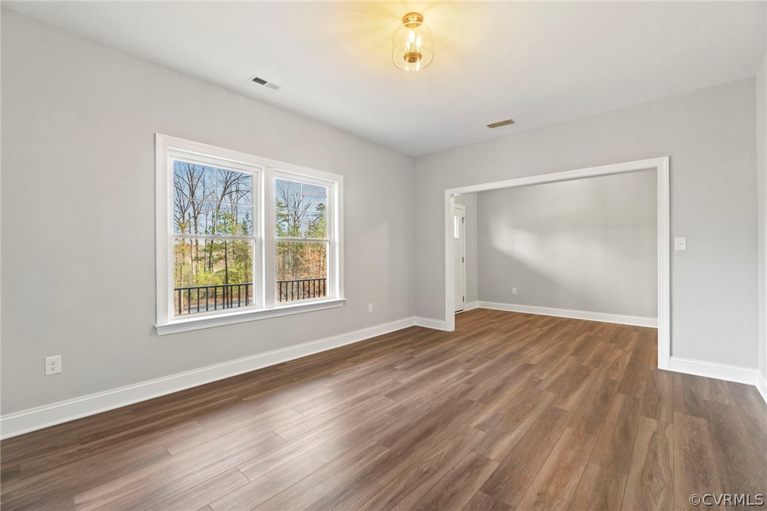 1 Hells Bend Road Palmyra, VA 22963 - Photo 8 of 37 a view of an empty room with wooden floor and a window