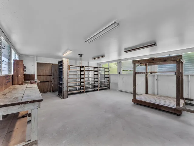 a room with furniture and a chandelier