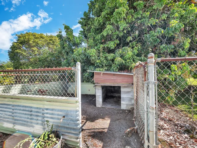 a view of a back yard of the building