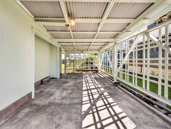 a view of a house with a street