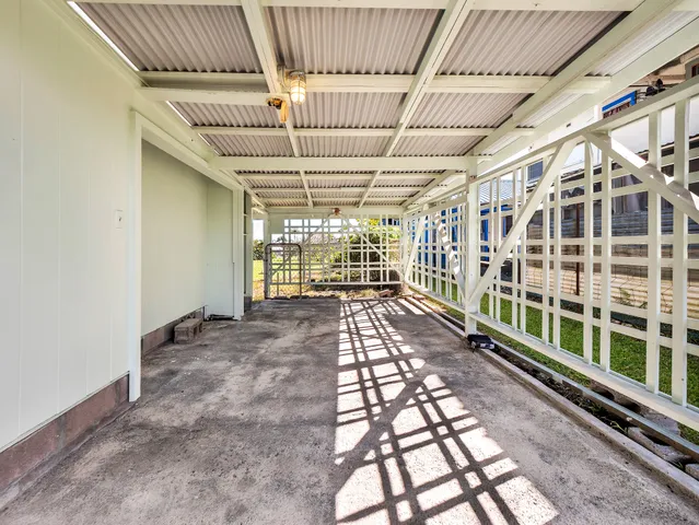 a view of a house with a street