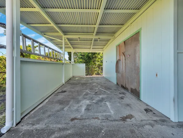 aerial view of a house with a swimming pool
