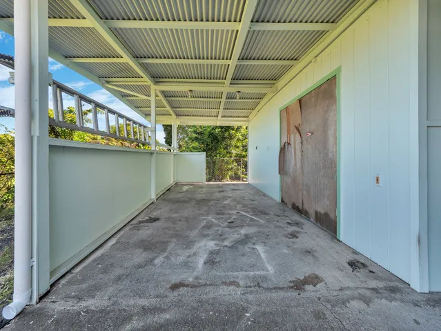 aerial view of a house with a swimming pool