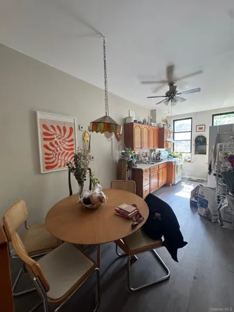 a view of a dining room with furniture