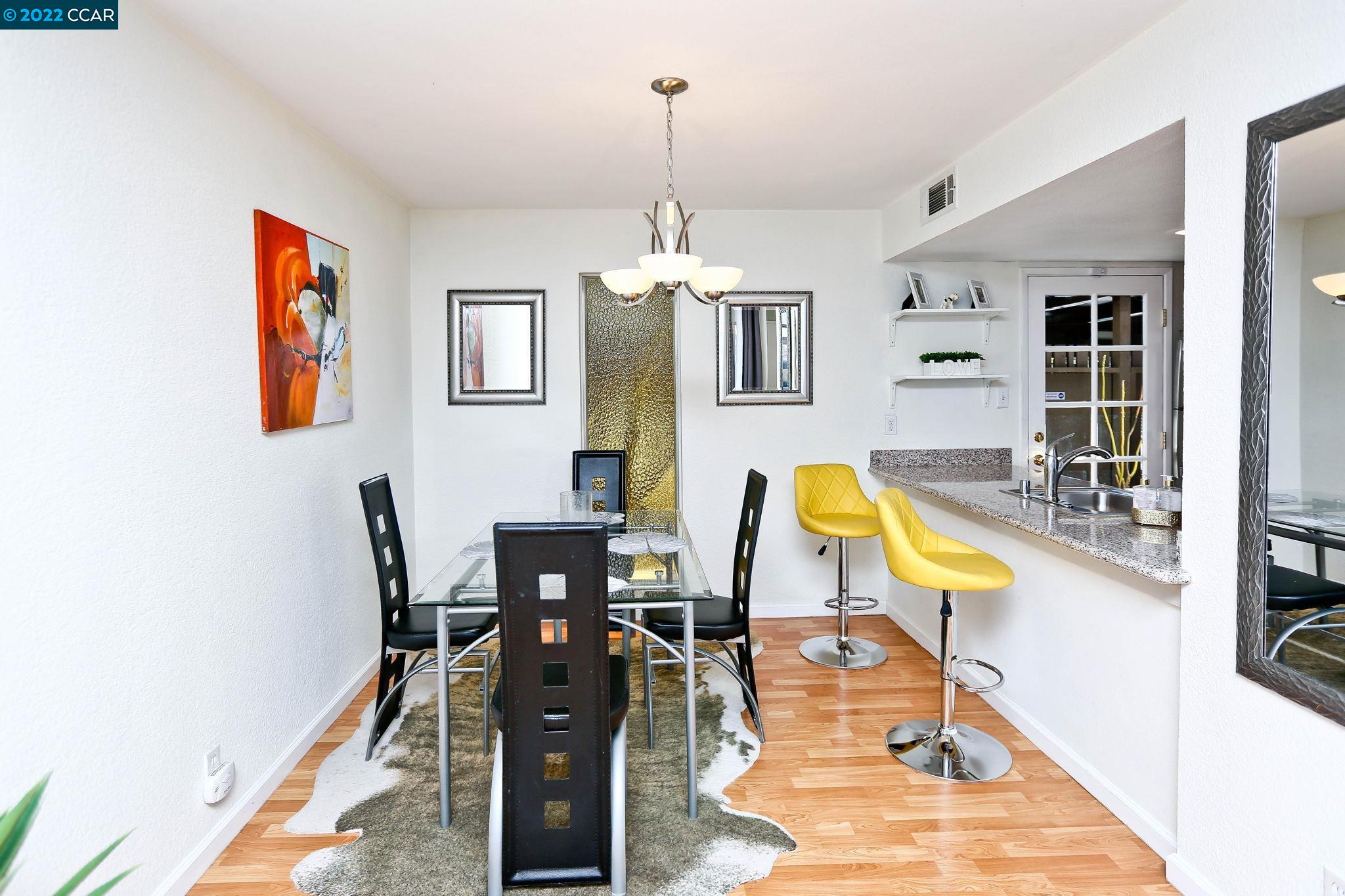 a view of a dining room with furniture