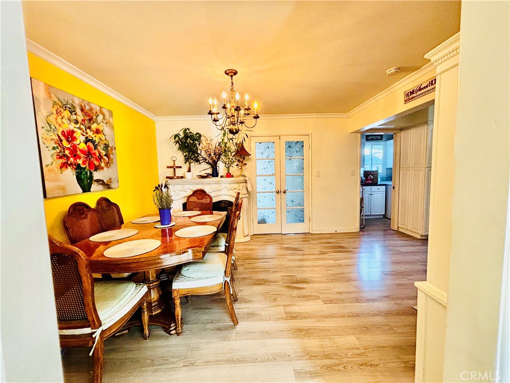 5604 Tower Road Riverside, CA 92506 - Photo 14 of 70 a view of a dining room with furniture and chandelier