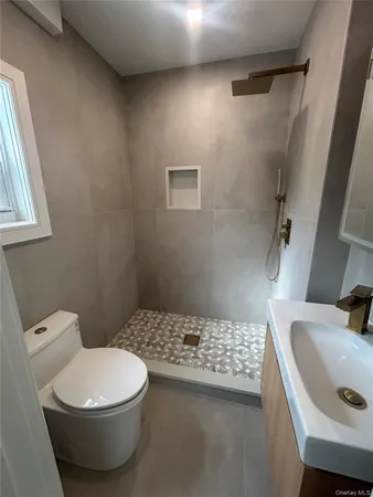 a bathroom with a sink and a toilet