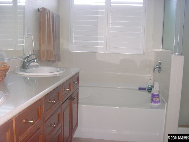 1743 Big Boulder Court Reno, NV 89521 - Photo 5 of 5 a bathroom with a sink and a bathtub