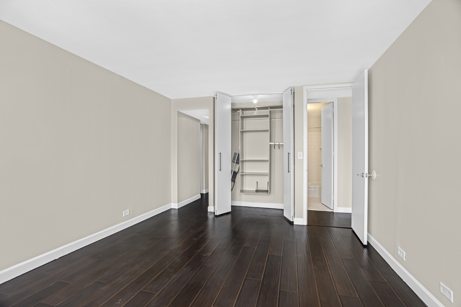 655 West Irving Park Road, Unit 1201 Chicago, IL 60613 - Photo 13 of 25 a view of empty room with wooden floor