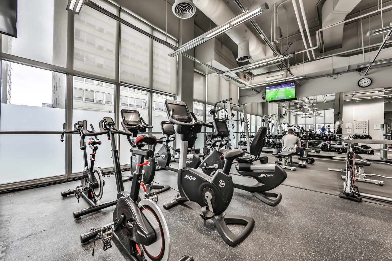 655 West Irving Park Road, Unit 1201 Chicago, IL 60613 - Photo 23 of 25 a view of a room with gym equipment