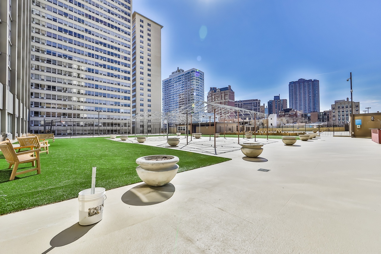 655 West Irving Park Road, Unit 1201 Chicago, IL 60613 - Photo 25 of 25 a view of a city with tall buildings