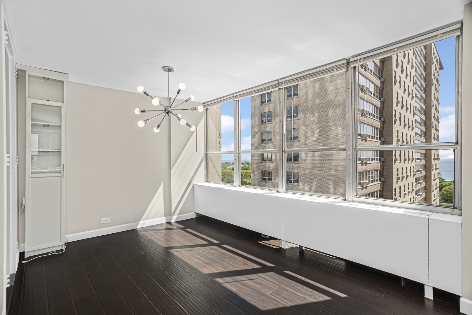 655 West Irving Park Road, Unit 1201 Chicago, IL 60613 - Photo 9 of 25 a view of an entryway with wooden floor